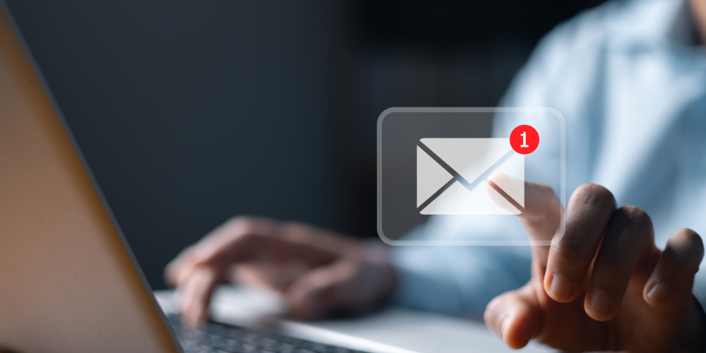 Dig Marketing-Sherwood Park-Alberta-Lead Generation-person checking emails on laptop-email icon